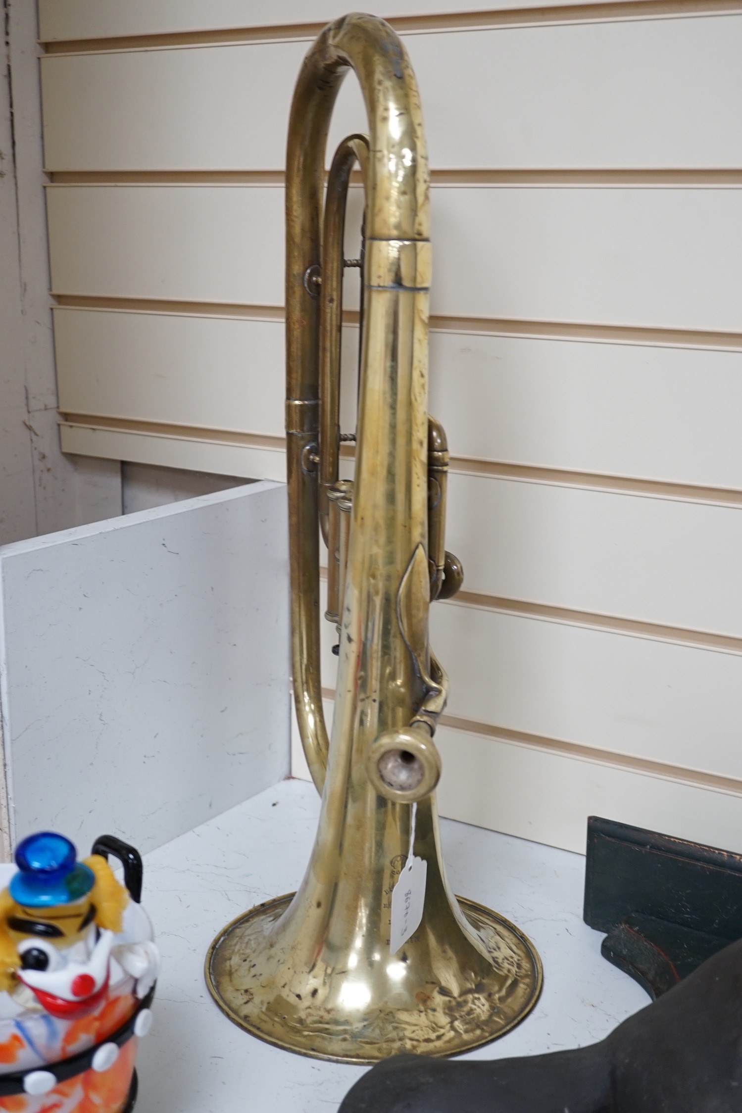 A brass euphonium by Butler, Haymarket, London and Dublin, 57cms long